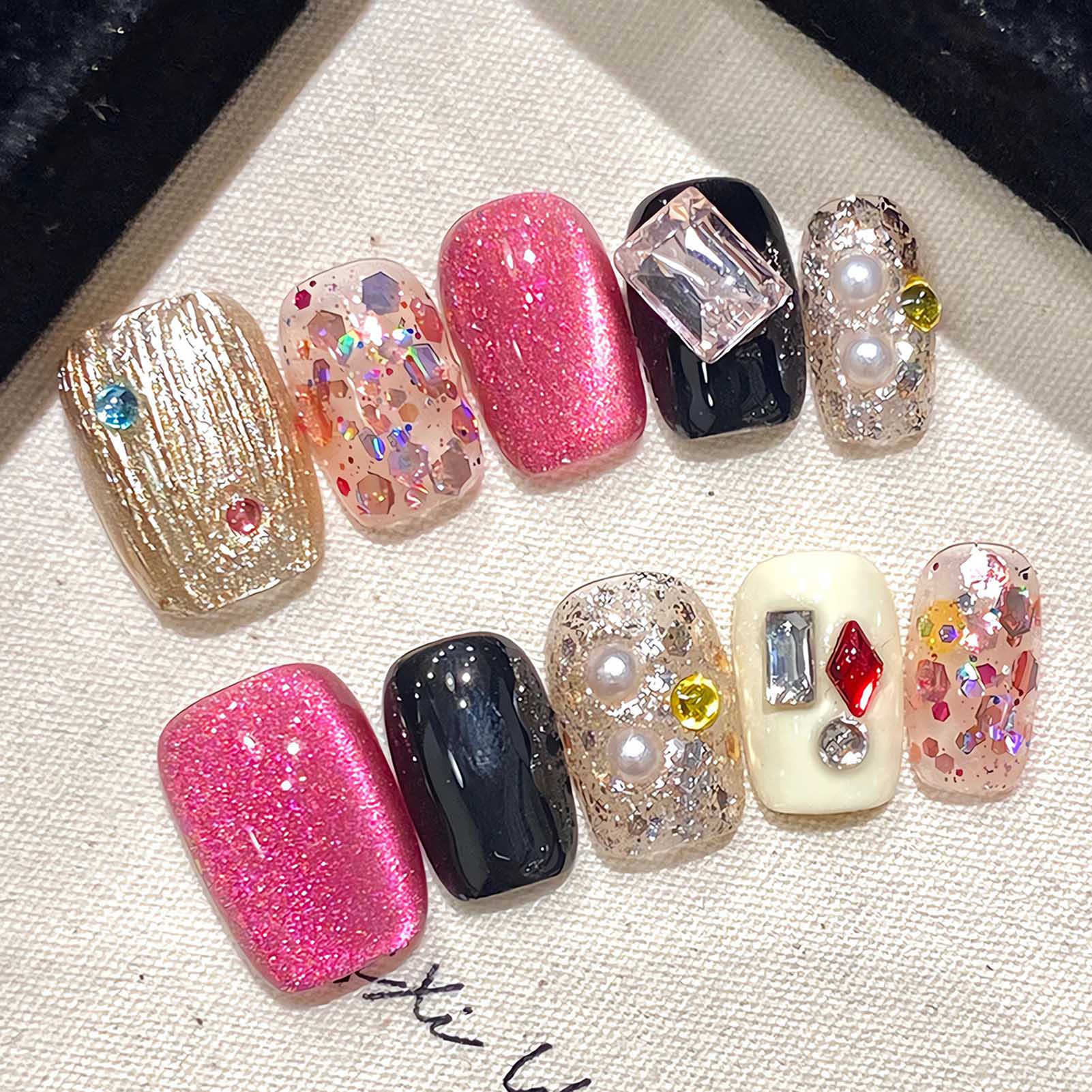 Nail Art Press On - เล็บปลอมสีชมพูแวววาวแบบทำด้วยมือเล็บปลอมมันวาวดีไซน์คริสตัลแวววาวทรงสี่เหลี่ยมสั้นดวงตาแมว
